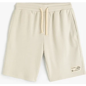 Şort Dokulu Cepli Beli Bağlamalı Pamuklu