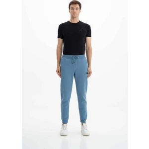 Erkek Regular Fit Cepli Arka Cep Fermuarlı Basic 3 İplik Şardonlu Dar Paça Lastikli Eşofman Altı K26174680001