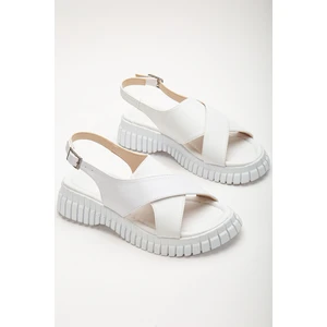 Kadın Beyaz Bilekten Bağlamalı Çapraz Bantlı Poli Yüksek Taban Sandalet