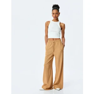 Beli Bağcıklı Dokulu Yüksek Bel Geniş Paça Pantolon