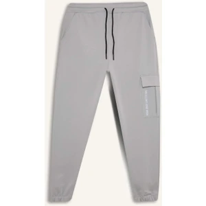 DeFactoFit Sporcu Jogger Eşofman Altı Standart Fit Üç Cepli Beli Bağcıklı Lastikli Paça D3741AX24WN