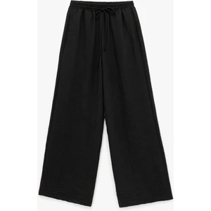 Beli Bağlamalı Lastikli Cepli Rahat Kesim Geniş Paça Pantolon