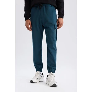 DeFactoFit Sporcu Jogger Eşofman Altı Standart Fit Üç Cepli Beli Bağcıklı Lastikli Paça D3741AX24WN