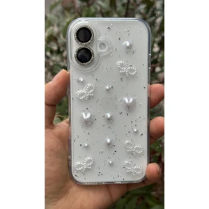 Apple iPhone 16 Uyumlu Inci Kalpli Fiyonk Şeffaf Kılıf Simli Darbeye Karşı Dayanıklı Kapak