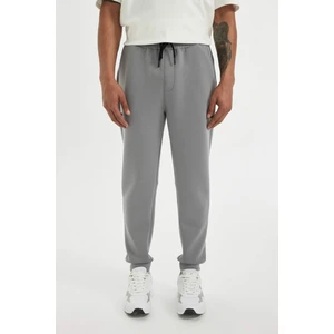 DeFactoFit Slim Fit Sporcu İnce Jogger Eşofman Altı Dar Kesim Skuba Dalgıç Kumaş Standart Paça Beli Bağcıklı Lastikli Paça Z9112AZ24AU