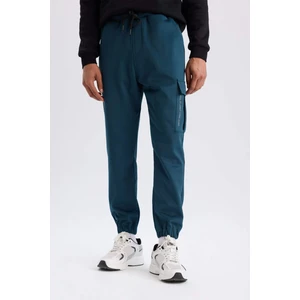 DeFactoFit Sporcu Jogger Eşofman Altı Standart Fit Üç Cepli Beli Bağcıklı Lastikli Paça D3741AX24WN