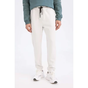 DeFactoFit Slim Fit Sporcu İnce Jogger Eşofman Altı Dar Kesim Skuba Dalgıç Kumaş Standart Paça Beli Bağcıklı Lastikli Paça Z9112AZ24AU