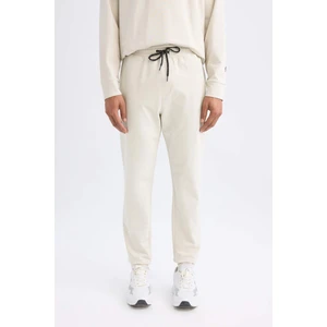DeFactoFit Sporcu Jogger Eşofman Altı Slim Fit Dar Kesim Standart Paça Beli Paçası Lastikli