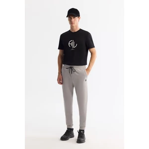 Erkek Taş Regular Fit Beli Bağcıklı Ayarlanabilir İpli 3 İplik Şardonlu Eşofman Altı B003403