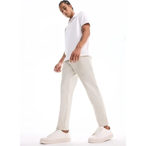 DeFactoFit Slim Fit Dar Kesim Standart Paça Esnek Multifonksiyonel Dokuma Sporcu Pantolon D9247AX25SP