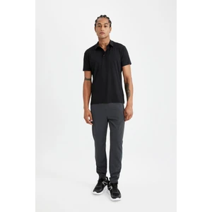 DeFactoFit Sporcu Dokuma Pantolon Slim Fit Dar Kesim Çift Cepli Fermuarlı Paça C9262AX24AU