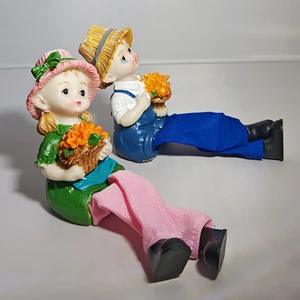 Big Store Sallanan Ayaklı Çiçek Sepeti Tutan Çocuk Biblosu