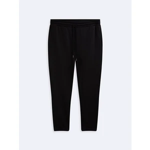 Beli Lastikli Dar Paça Siyah Eşofman