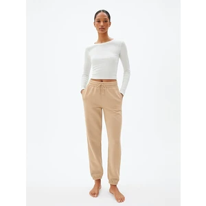 Beli Lastikli Dar Paça Krem Eşofman