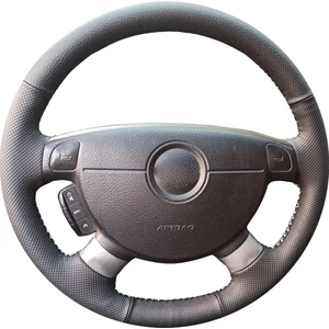 İskender Oto Aksesuar Direksiyon Klıfı Chevrolet Kalos - Aveo 2004 - 2008 Sport Siyah Dikişli KENDİ FABRİKASYON DERİSİ SÖKÜLMEDEN YAPILIR Detay deri direksiyon