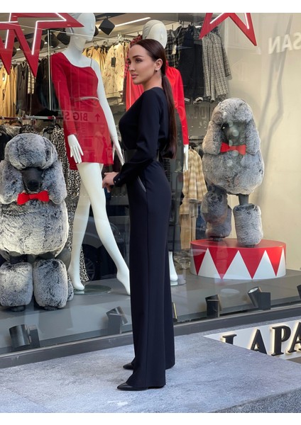 Kadın Kruvaze Yaka Deri Biye Detaylı Kemerli Krep Bol Paça Tasarım Tulum fiyatları