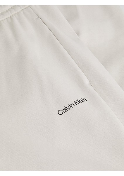 Calvin Klein Erkek Pamuklu Relaxed Fit Yüksek Bel Bej Eşofman Altı K10K109940-ACE