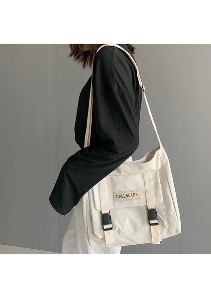 Sarkıt Stili ile Sarı Naylon Su Geçirmez Kanvas Okul Çantası Şık Japon Tarzı Basit Postacı Çantası Kore Postacı Çantası (Yurt Dışından) fırsatları