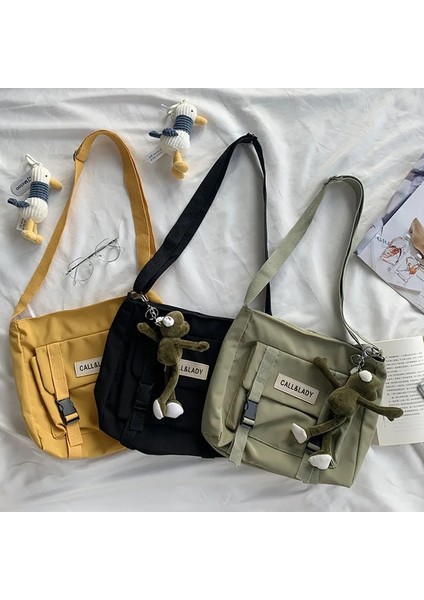 Sarkıt Stili ile Sarı Naylon Su Geçirmez Kanvas Okul Çantası Şık Japon Tarzı Basit Postacı Çantası Kore Postacı Çantası (Yurt Dışından) indirimleri