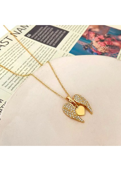 Kararmaz Paslanmaz Altın Kaplama Zirkon Taşlı Gold Renk Melek Kanadı Çelik Kolye fiyatları