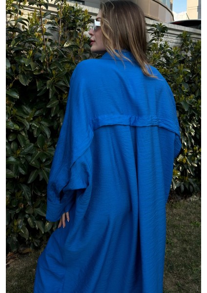 Kadın Saks Yarasa Kol Arkası Pliseli Çift Cepli Uzun Oversize Salaş Gömlek Elbise fırsatları