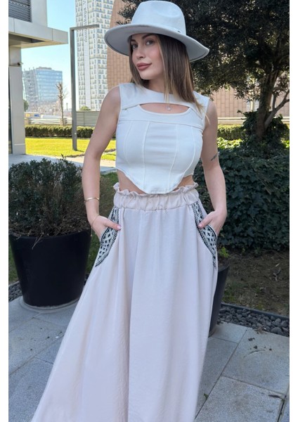 Kadın Bej Beli Lastikli, Cepleri Hasır Işlemeli, Rahat Kesim, Uzun Kiloş Etek fırsatları