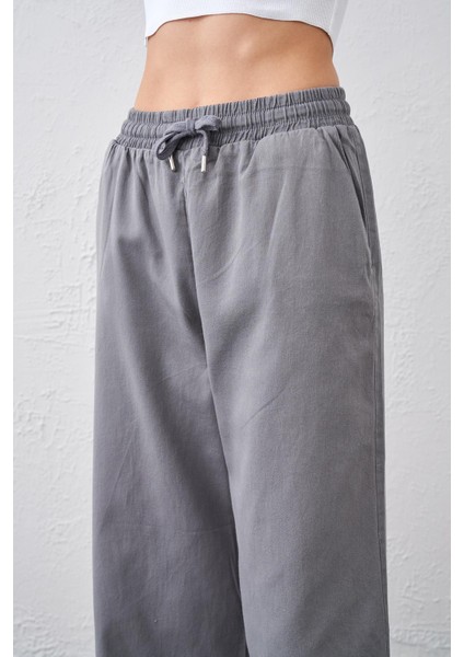Kadın Gri Beli Bağlamalı Geniş Piş Dikişli Paça Pantolon fırsatları