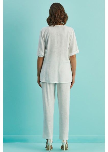 Düz Paça Beyaz Keten Pantolon fiyatları