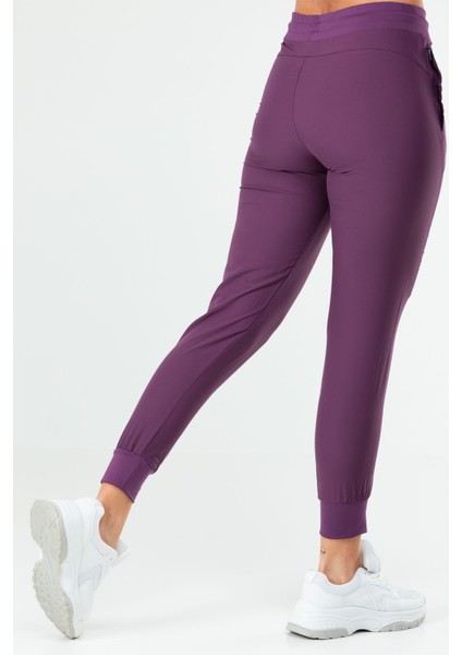 Tekno Trust Normal Bel Mürdüm Regular Fit Düz Dar Paça Kadın Eşofman Alt Mor Örme Standart