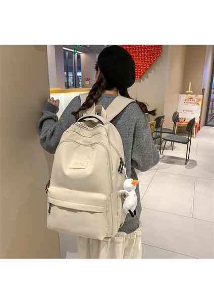 Kadınlar Için Sırt Çantası 2024 Yeni Stil Orta Okul Kız Kız Büyük Kapasiteli Lise Çantası Kolej Kız Basit Sırt Çantası (Yurt Dışından) modelleri