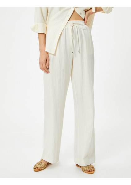 Beli Bağcıklı Pantolon Düz Paça Cepli Standart Kesim modelleri