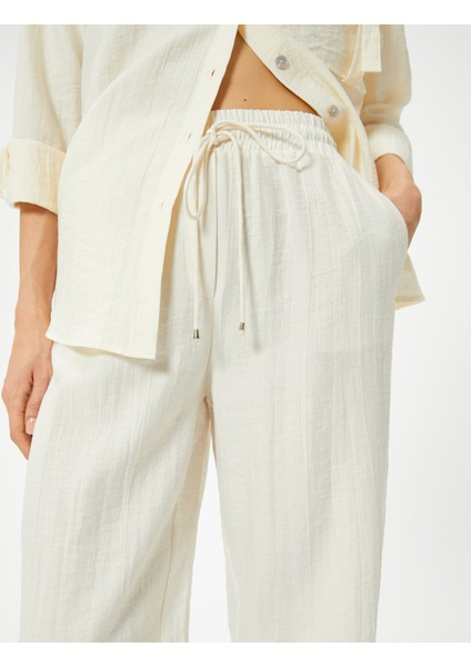 Beli Bağcıklı Pantolon Düz Paça Cepli Standart Kesim indirimleri