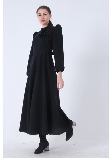 Siyah Tüvid Kumaş Çiçek Detaylı Kolları Lastikli Seyyar Kuşaklı Elbise 4593267.01 fiyatları