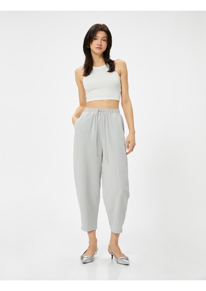 Havuç Pantolon Beli Bağcıklı Normal Bel Cep Detaylı Modal fiyatları