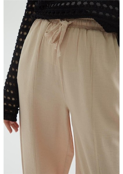 Beli Lastikli Pantolon Bej fırsatları