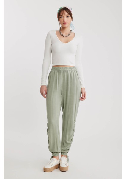 Yanları Büzgülü Beli ve Paçası Lastikli Pantolon fiyatları