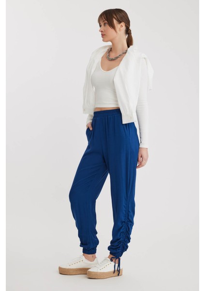 Yanları Büzgülü Beli ve Paçası Lastikli Pantolon modelleri