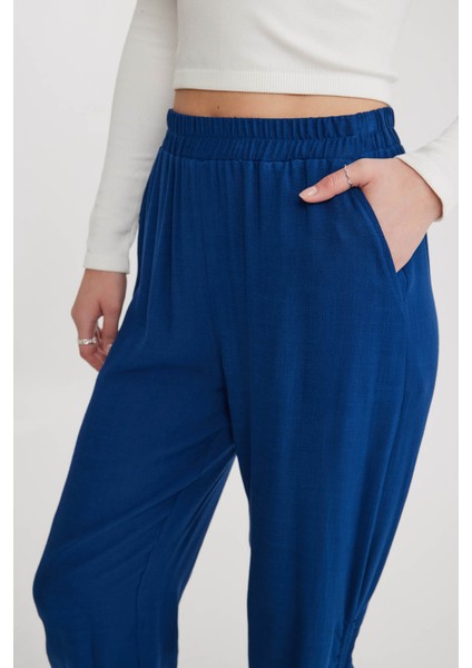 Yanları Büzgülü Beli ve Paçası Lastikli Pantolon indirimleri