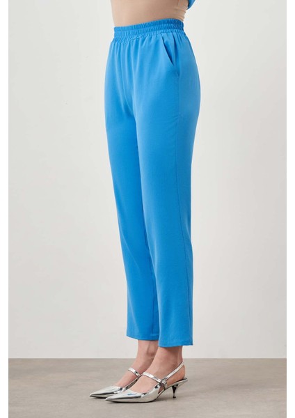 Beli Lastikli Dar Paça Mavi Pantolon fiyatları