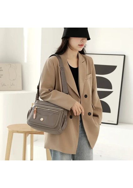 Kiraz Çiçeği Tozu Kadın Rahat Cep Telefonu Sırt Çantası Çok Katmanlı Tek Omuz Çantası Büyük Kapasiteli Anti Sıçrama Naylon Crossbody Çanta Annenin Çantası (Yurt Dışından) modelleri