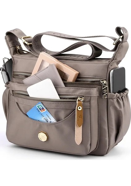 Kiraz Çiçeği Tozu Kadın Rahat Cep Telefonu Sırt Çantası Çok Katmanlı Tek Omuz Çantası Büyük Kapasiteli Anti Sıçrama Naylon Crossbody Çanta Annenin Çantası (Yurt Dışından) indirimleri