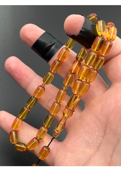 Ateş Kehribar Tesbih Sarı Kapsül Model 7X11MM 33 Tane Sistemli Tane Boşlukları Ayarlanabilir Püskül AK04075.180324