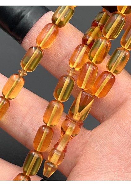 Ateş Kehribar Tesbih Sarı Kapsül Model 7X11MM 33 Tane Sistemli Tane Boşlukları Ayarlanabilir Püskül AK04075.180324