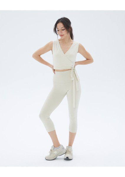Krem Anvelop Belden Bağlamalı Kolsuz Crop Bluz fırsatları
