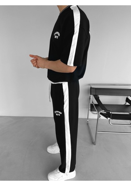 Erkek Yazlık Baggy Fit 'champion Boys' Baskılı Çizgili Eşofman Siyah modelleri