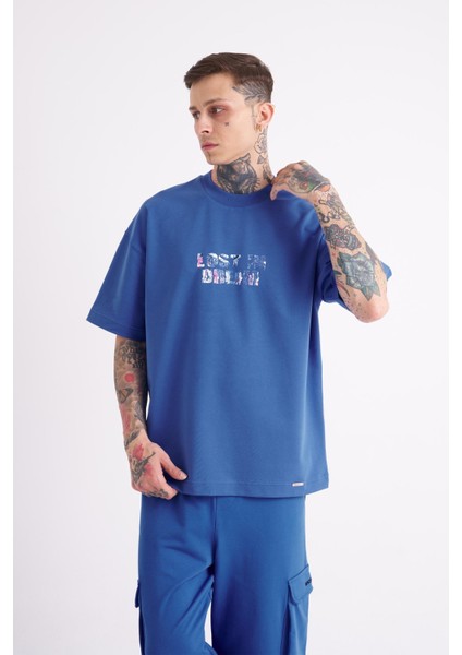Erkek Lost In Dream Baskılı Oversize Açık Mavi Tişört fiyatları