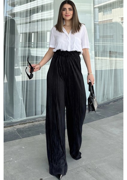 Kadın Siyah Beli Lastikli Yüksel Bel Salaş Kesim Bol Paça Bürümcük Pantolon indirimleri