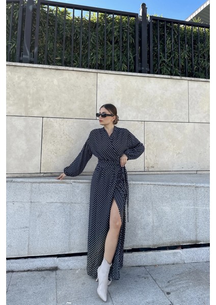 Kadın Siyah Kruvaze Yaka, Yırtmaçlı, Beli Kuşaklı, Bilekleri Lastikli, Salaş, Uzun Elbise fiyatları