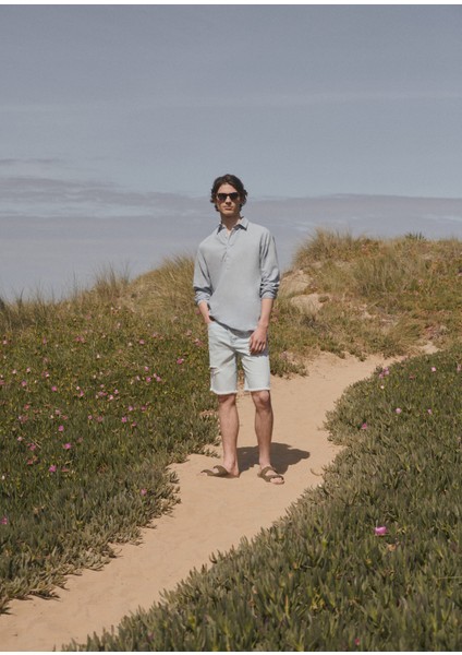 Yırtık detaylı denim bermuda şort indirimleri