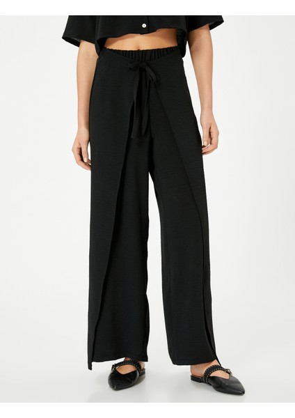 Bol Paça Pantolon Kapaklı Bağlama Detaylı Beli Lastikli modelleri